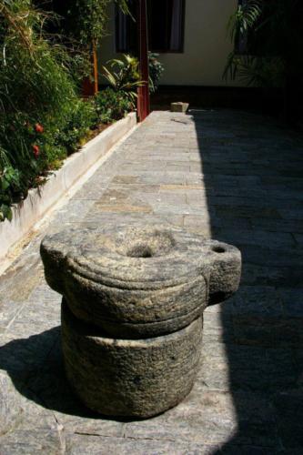 Antique granite grinding stone